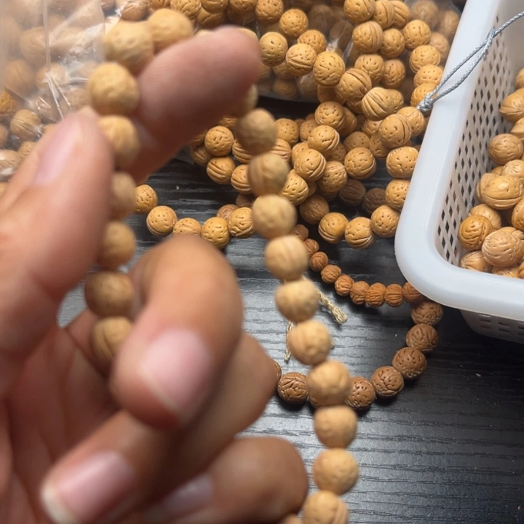 伍***玖文玩核桃手串小桃核散籽批发