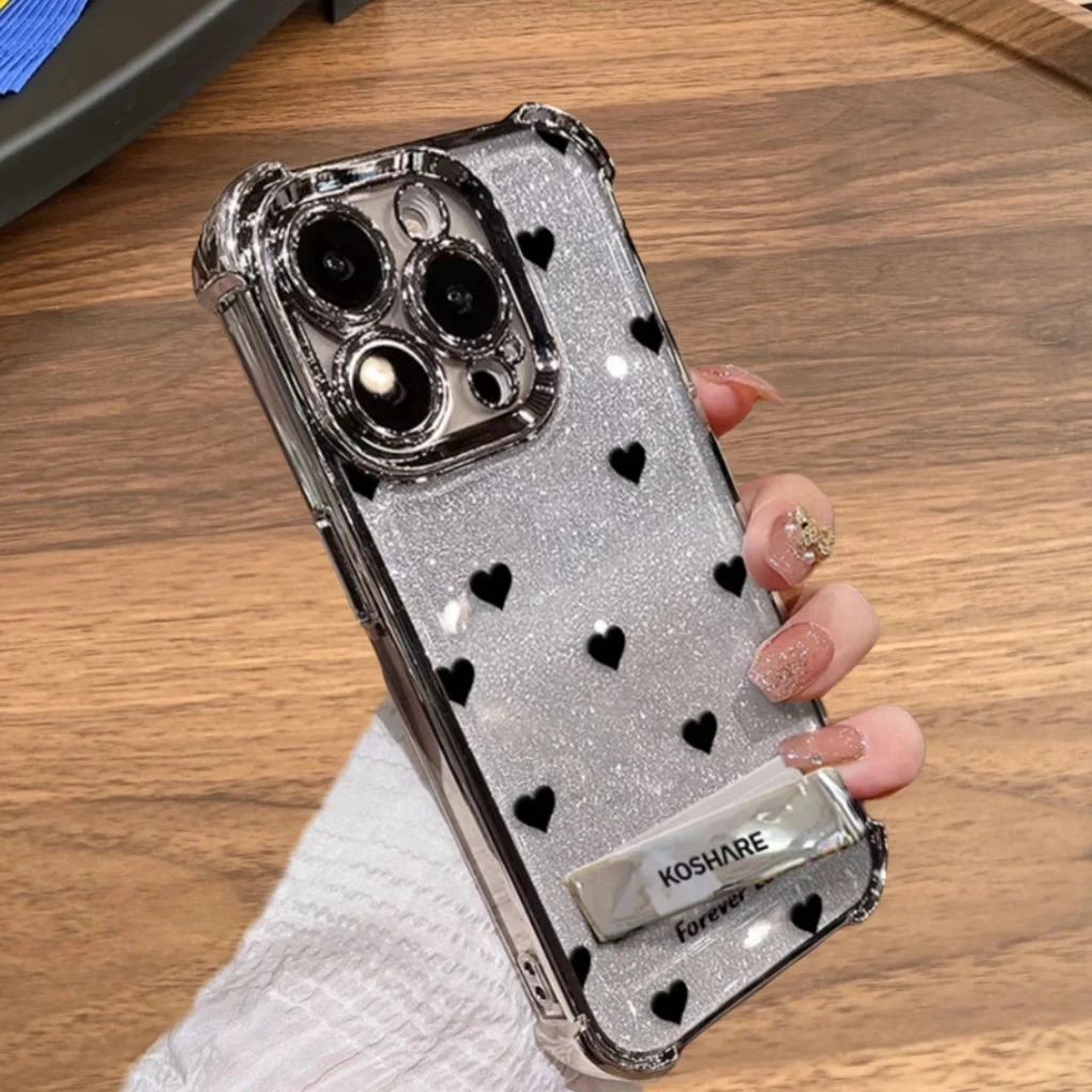 黑色爱心四角防摔适用IPhone16手机壳15闪粉卡纸14pro支架13/12银