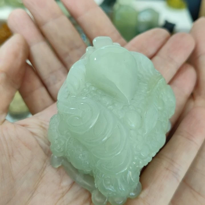 朱***语岫玉未镶嵌手把件款式