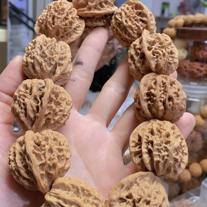 【闪购商品】文玩核桃把件35玲珑塔手持油