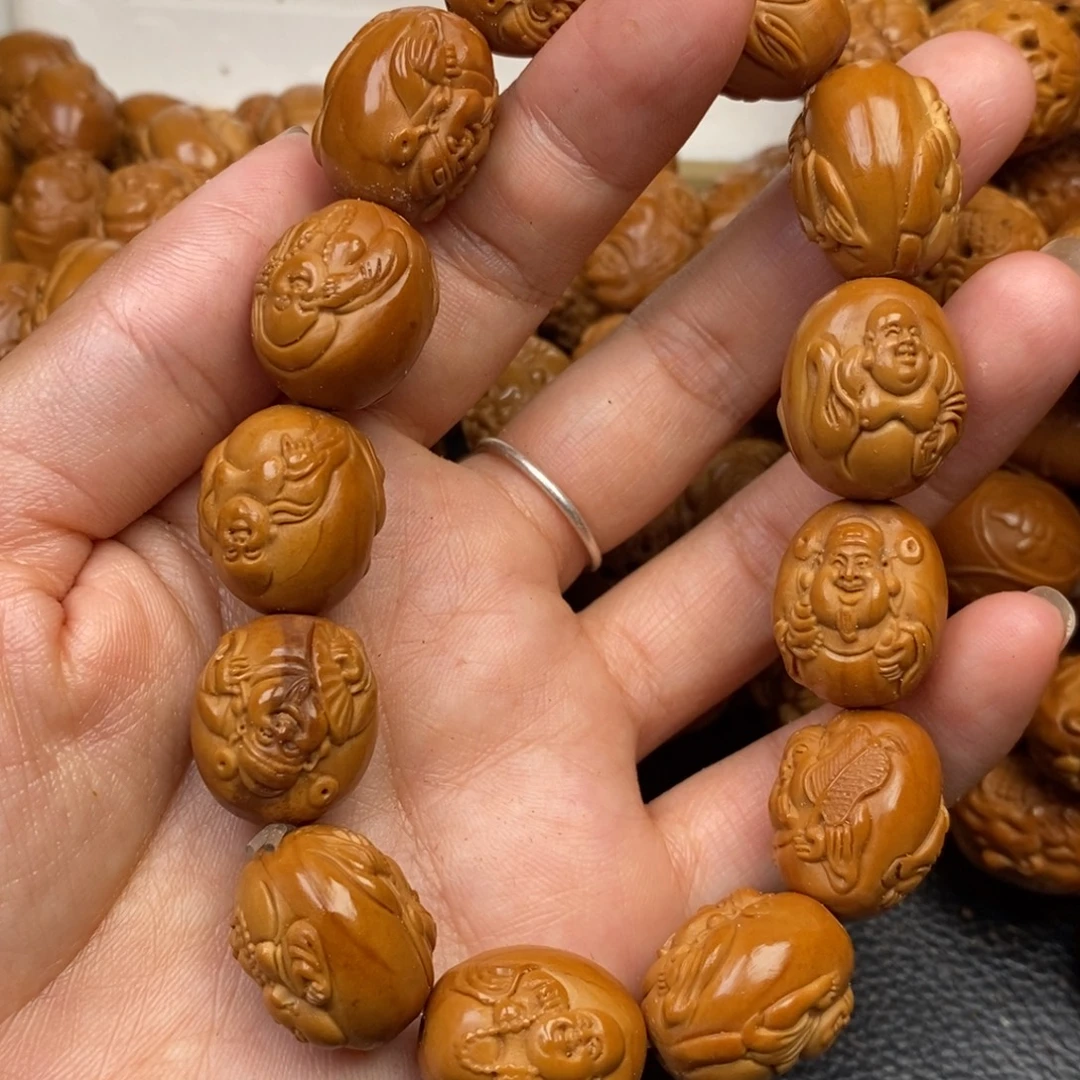 戒***色橄榄核手串反油特价