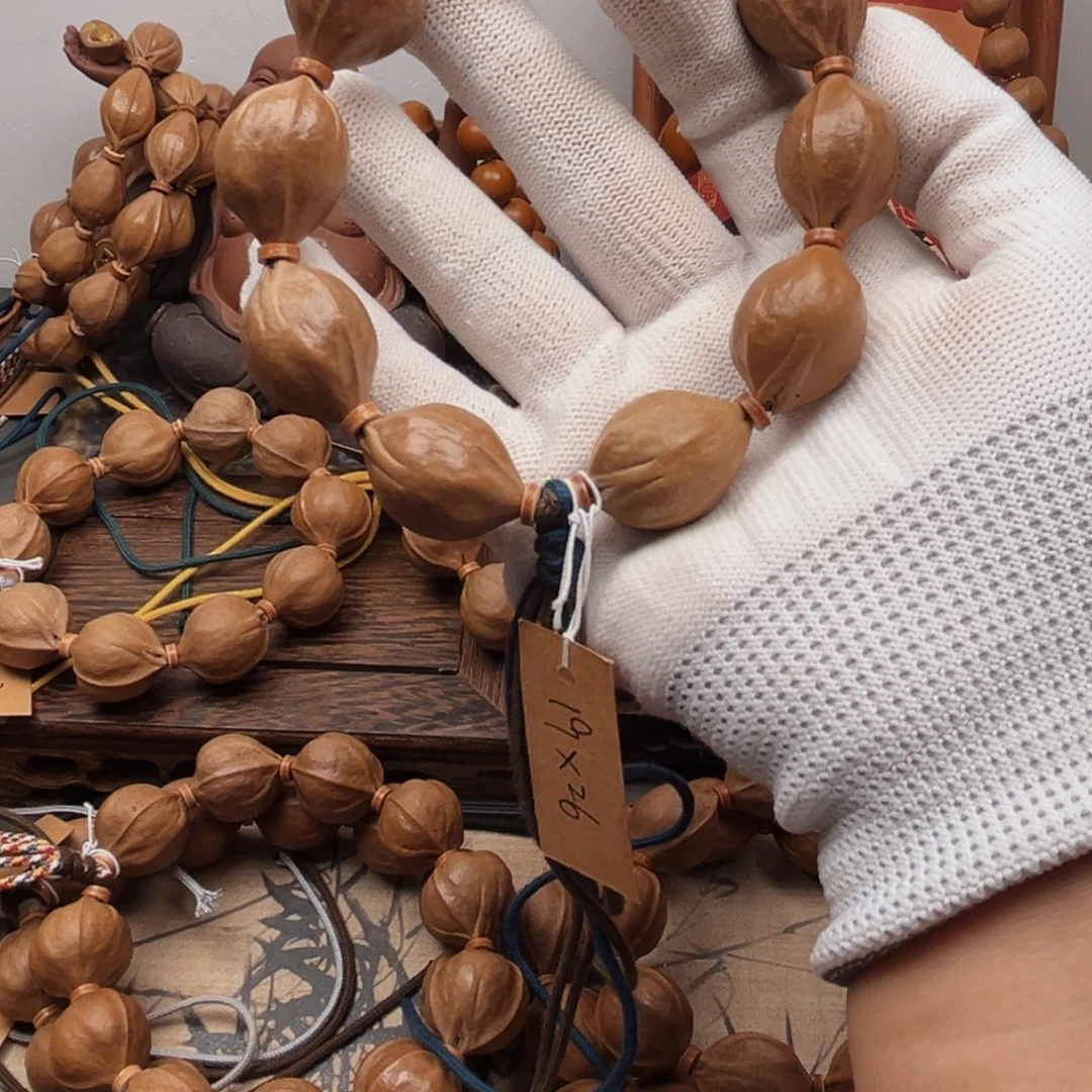 葫***，橄榄核手串19.26梅林铁核