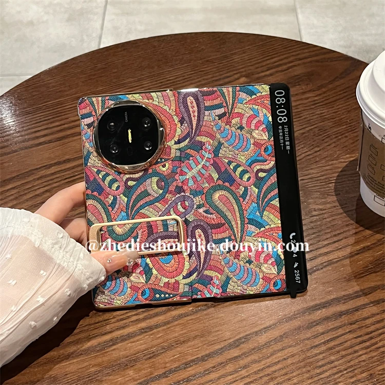 适用华为MateX6真皮腰果花腕带支架手机壳防摔MateX5磁吸翻盖皮套