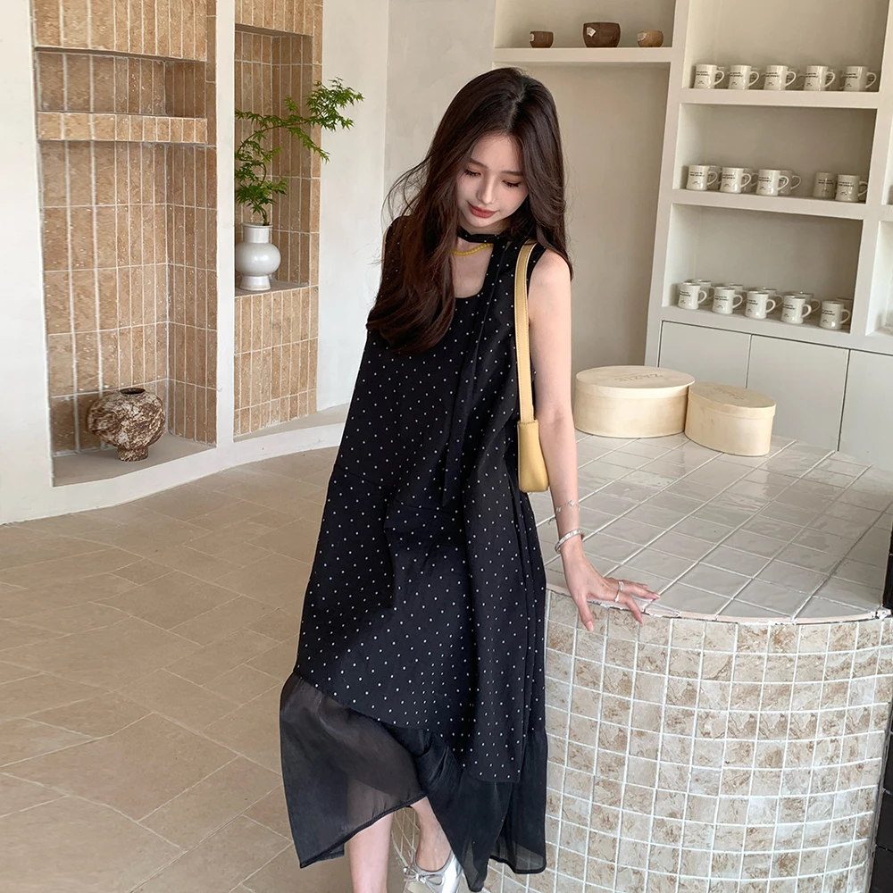 黑色赫本风波点无袖连衣裙女2025夏新款法式气质减龄网纱拼接长裙