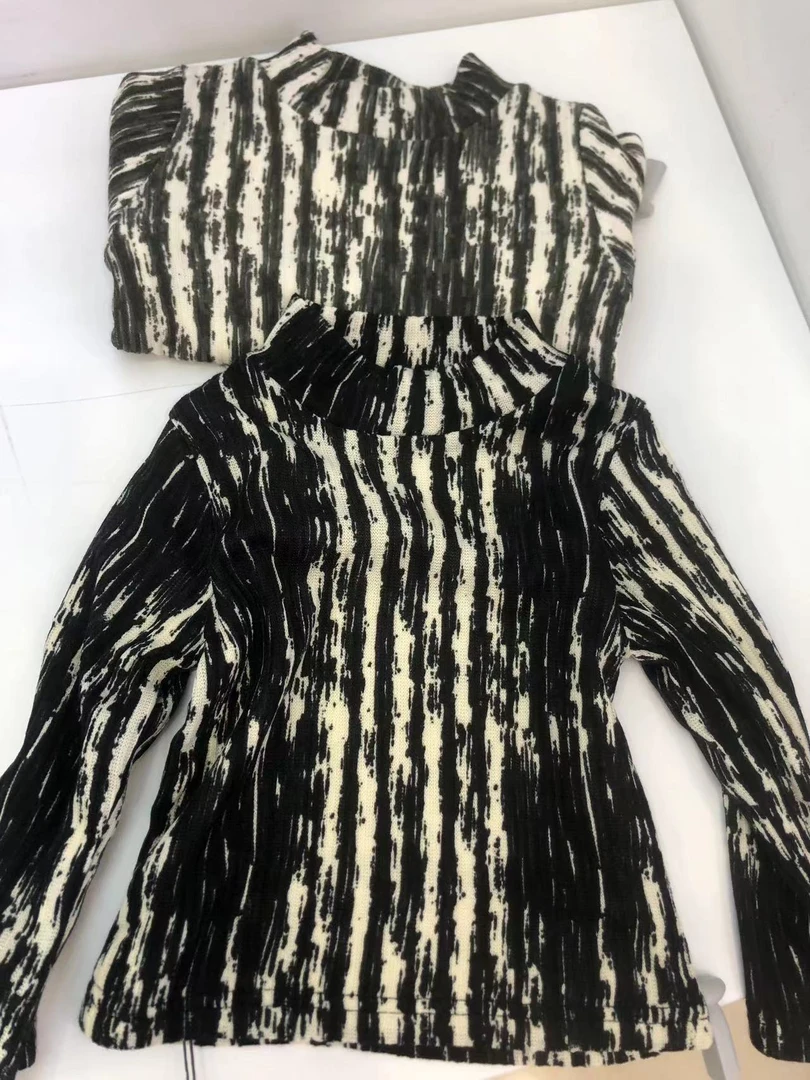 00儿童加绒加厚水墨竖条打底衫