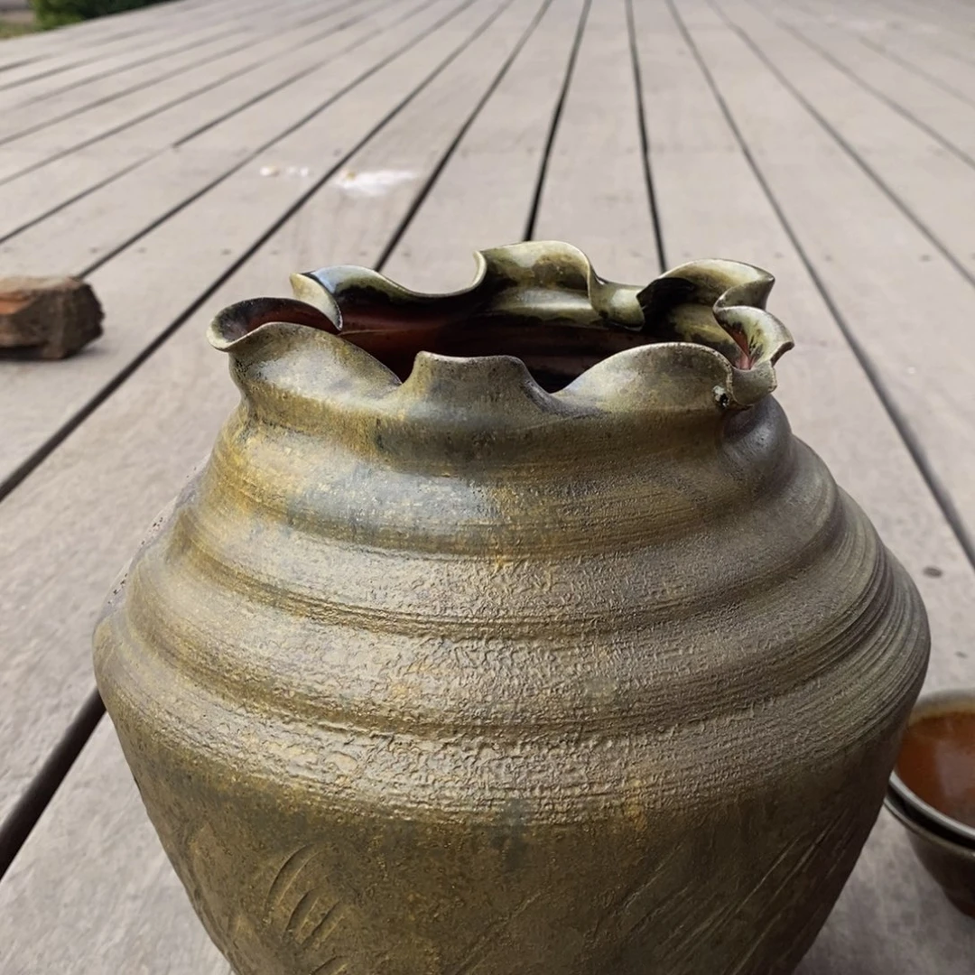看***。陶通红系列花器瑕