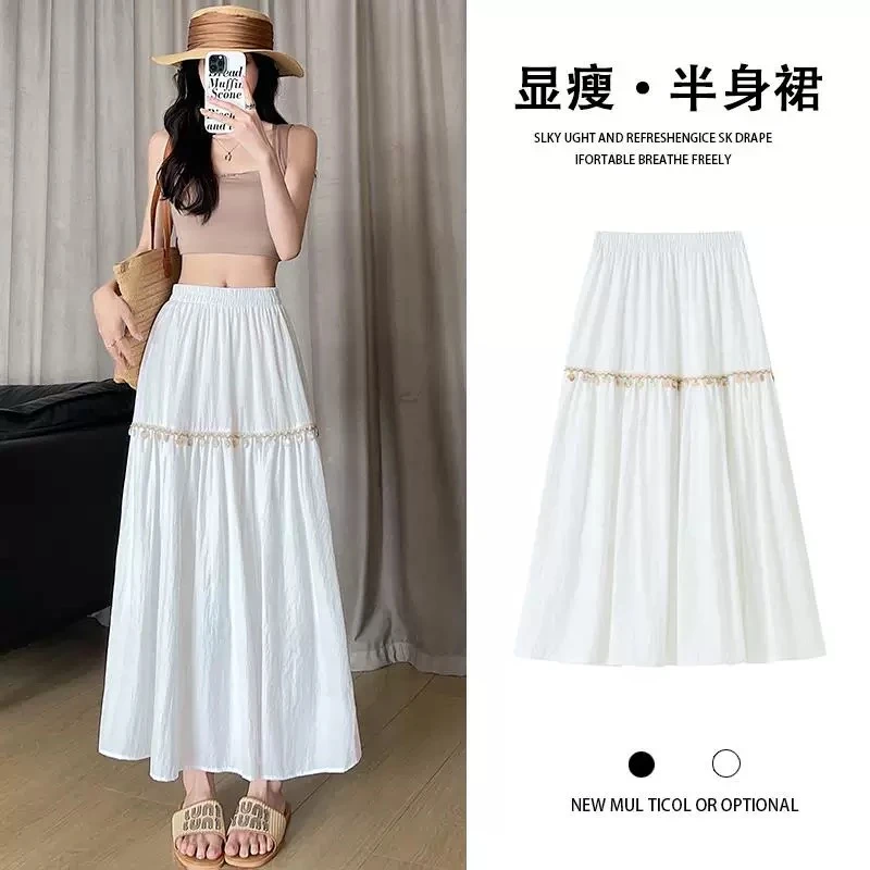 波西米亚民族松紧半身裙2025流苏新款气质夏季优雅高腰显瘦长裙