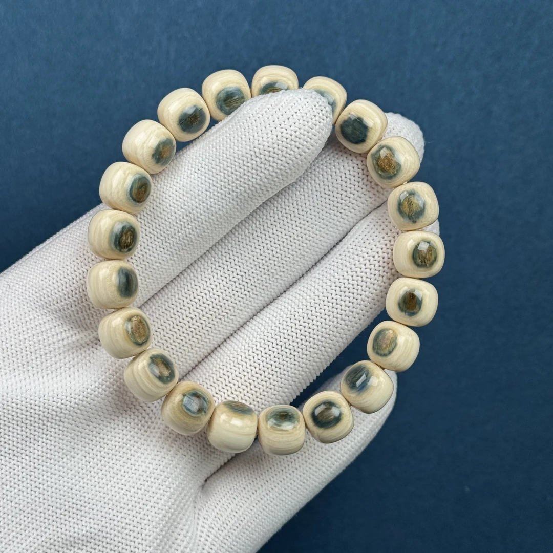 Q43-62天然猛犸牙 精品蓝眼睛手串 约10*9mm 支持复检假一罚十