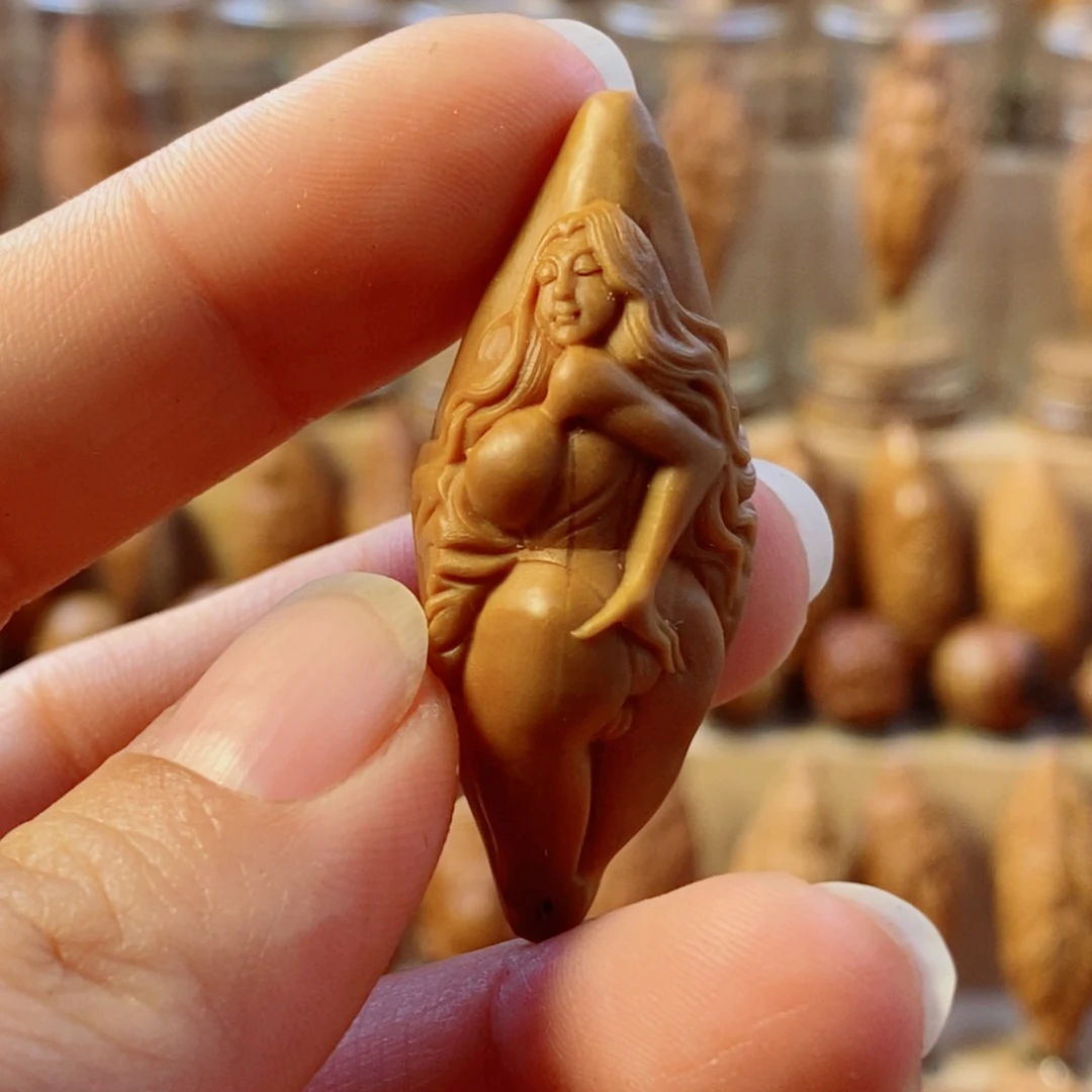 我***游橄榄核手串/手链开凤美女