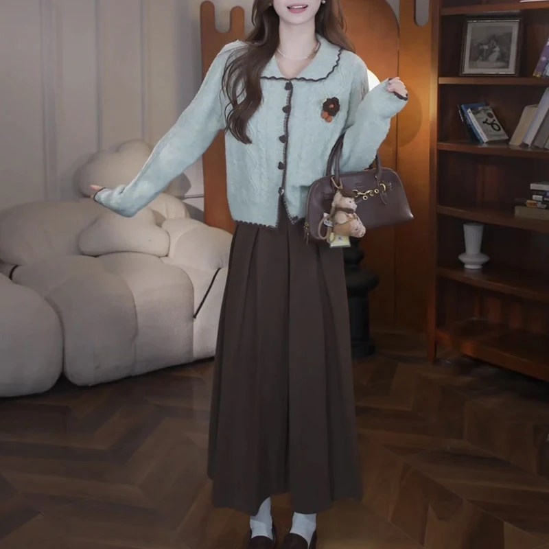 韩系气质套装女2025冬季新款慵懒风绿色洋气开衫百搭半身裙两件套