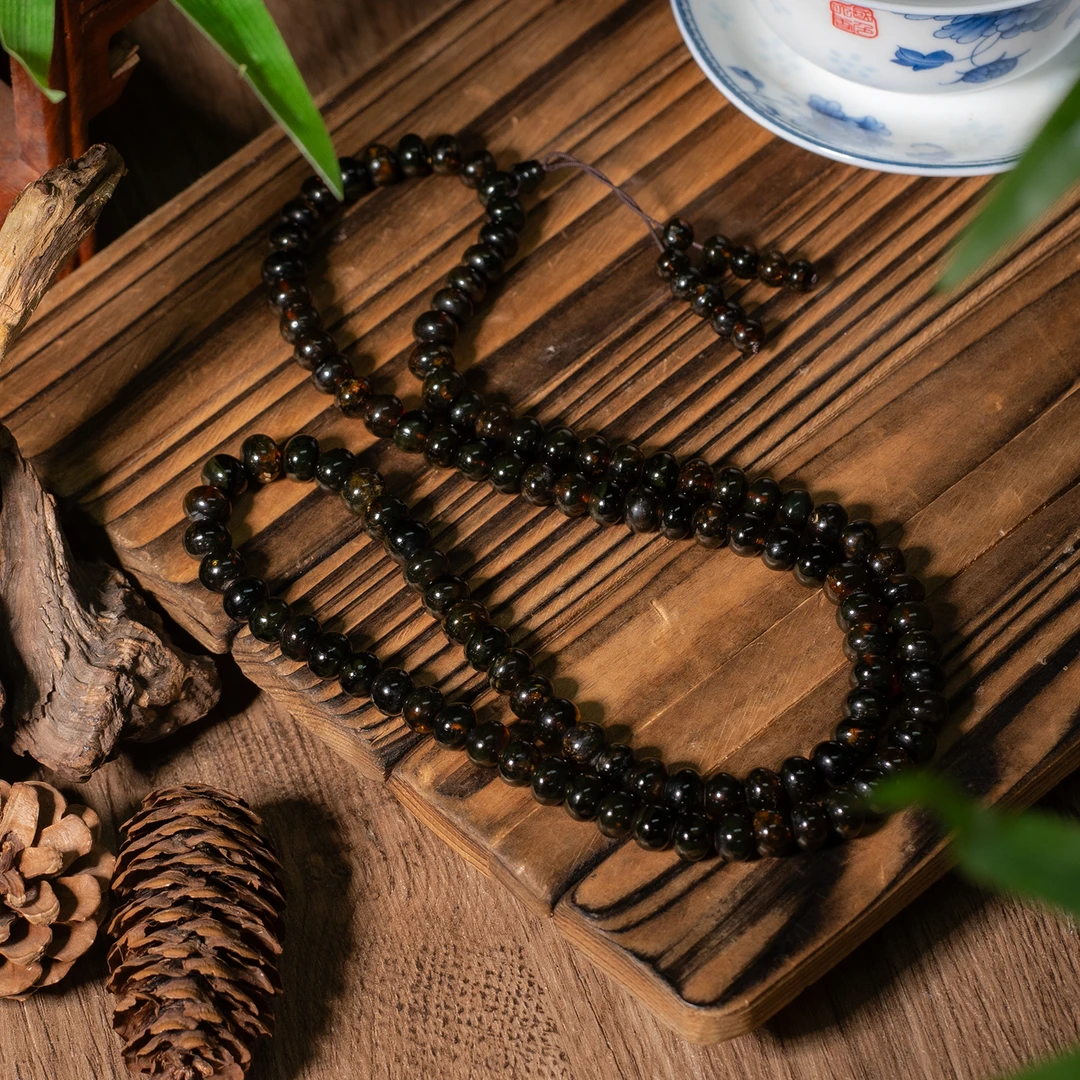 世间臻宝-抚顺琥珀翳珀佛珠/多样性发/P5888