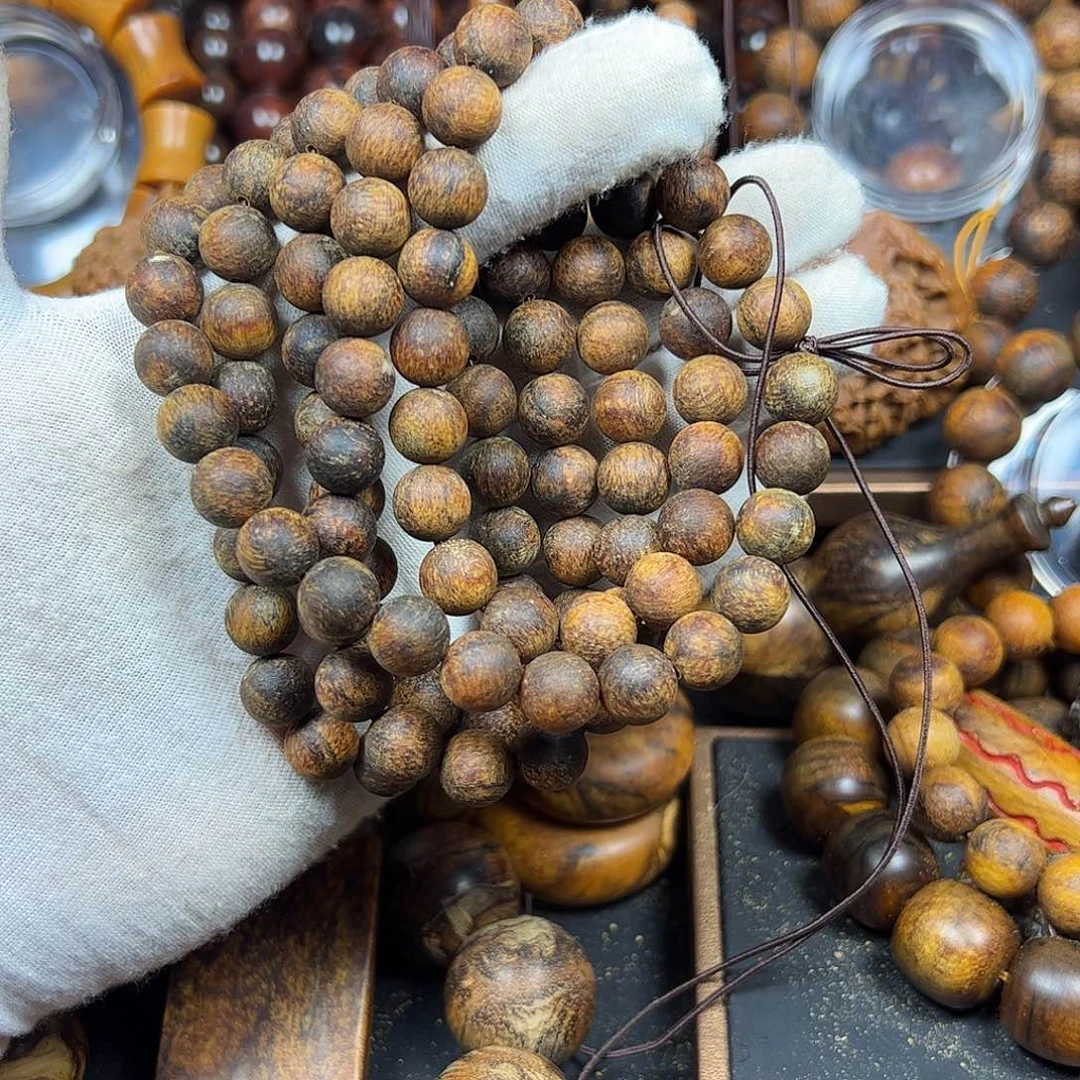 贡木月***酌10多圈龙鳞粗抛手串