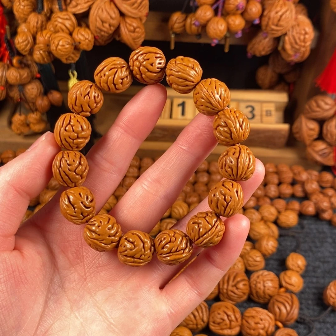 吊坠桃核7链接桃枭手串