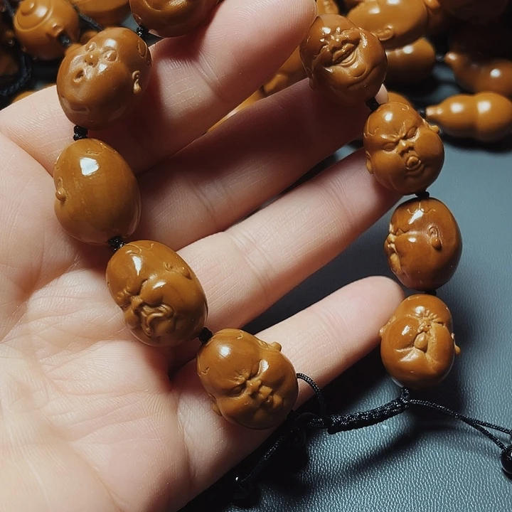 百态人生，橄榄核雕工艺