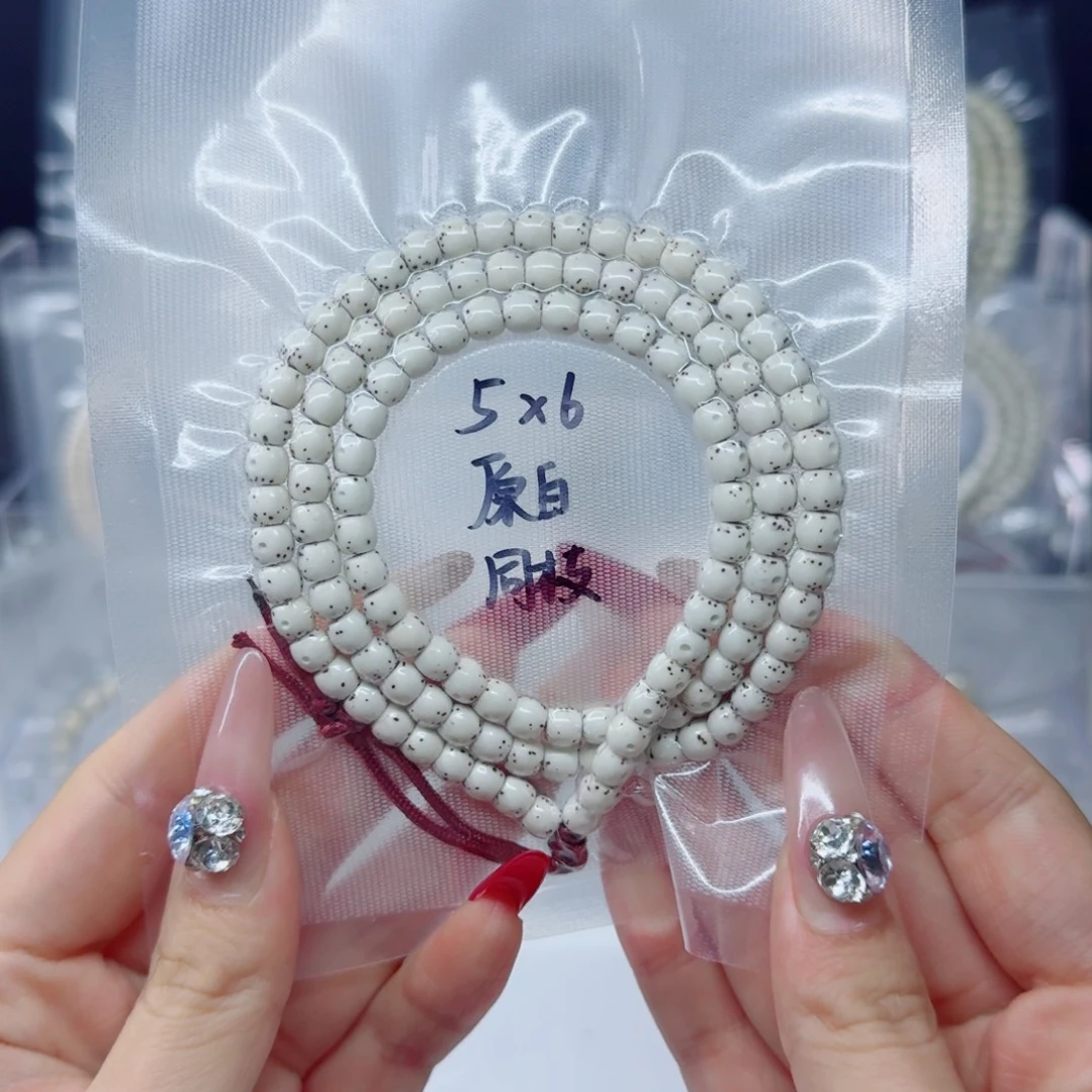 Y***吊坠星月菩提6*5原白直切鼓珠带月贯通