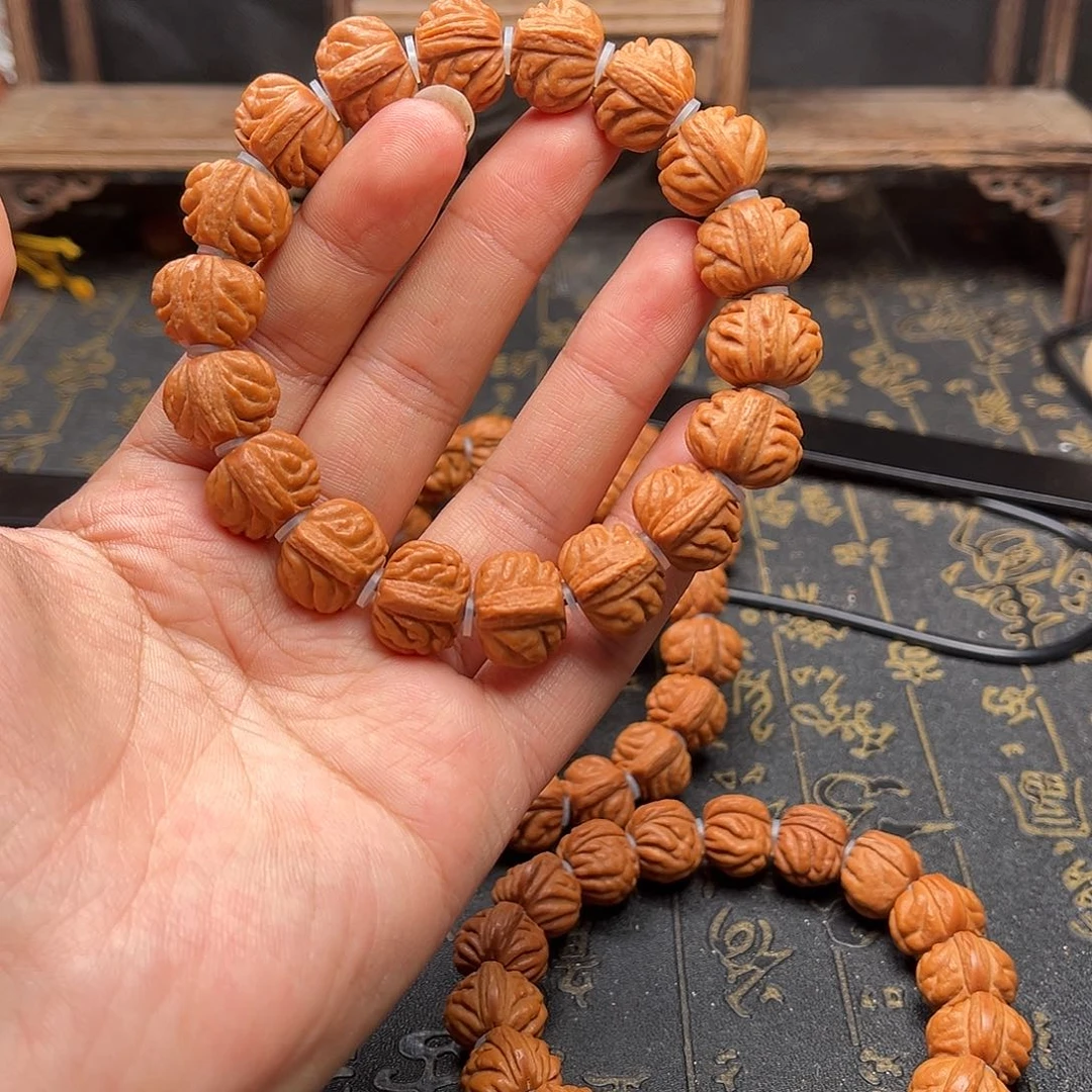 吊坠桃核小金豆手串