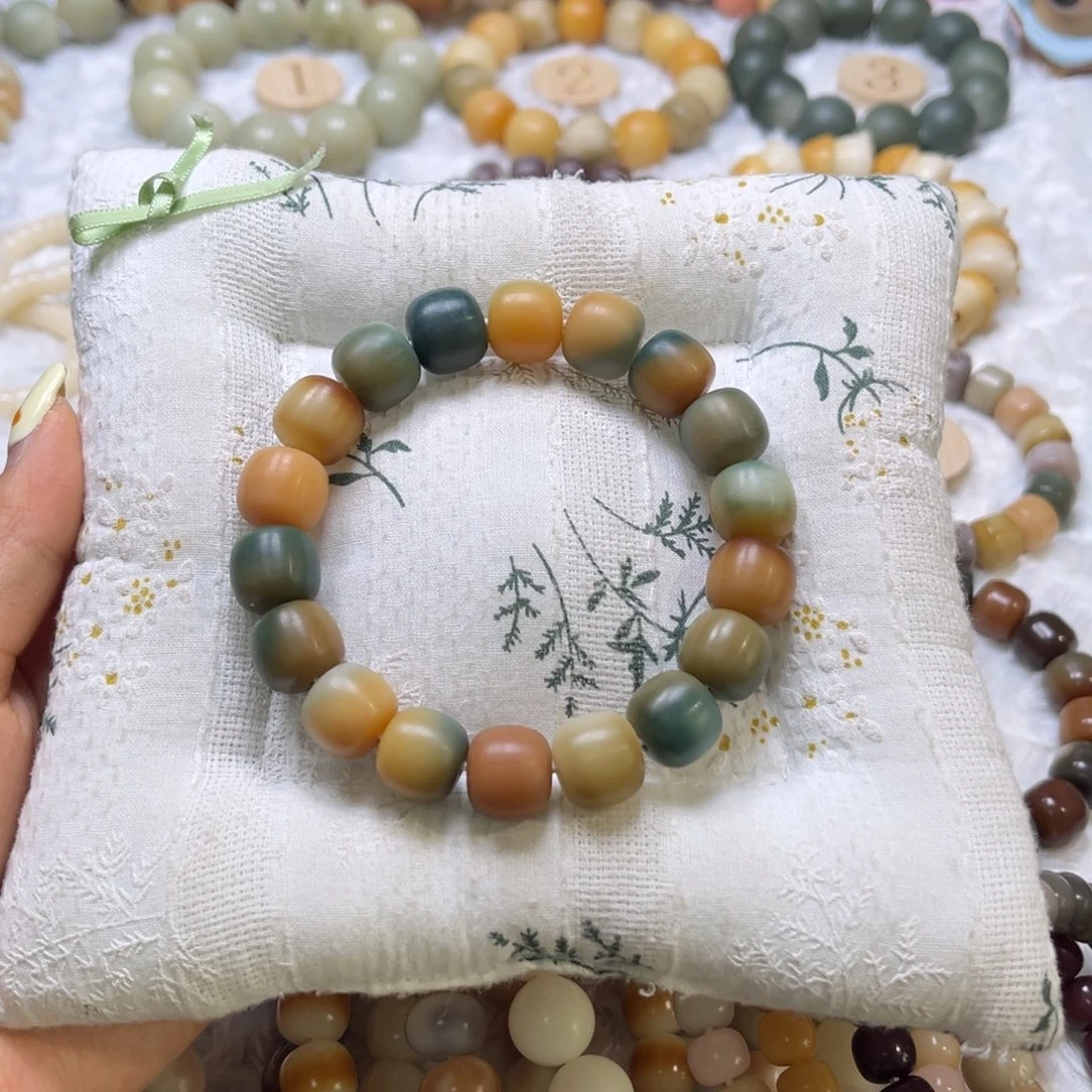 菩提根/象牙果吊坠炫彩花皮桶珠520