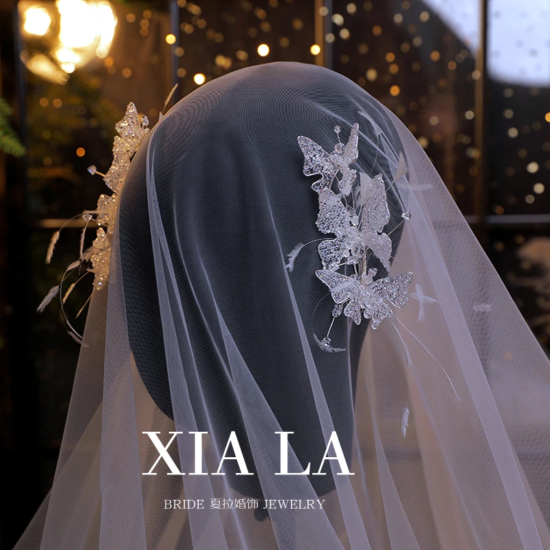 夏拉新款仙气白色透明蝴蝶新娘头饰梦幻白羽毛婚纱发饰精美配饰品