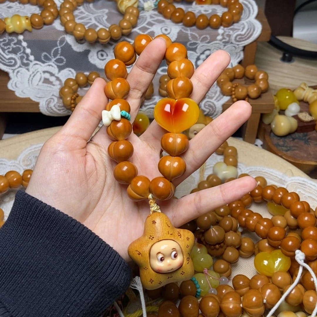 吊坠猴头核桃屁桃玻璃底卡15