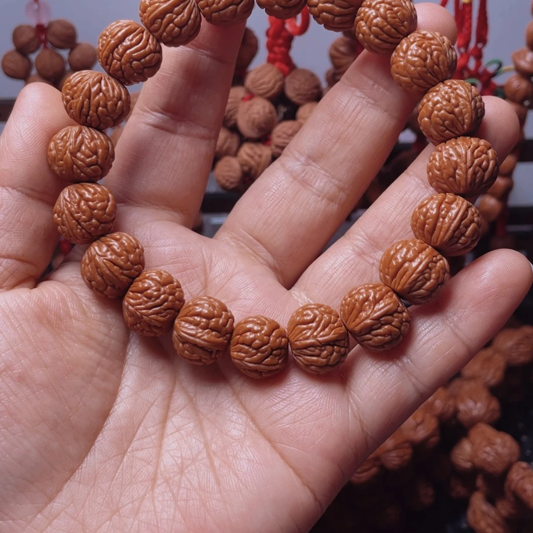 木质类龙纹桃枭手串