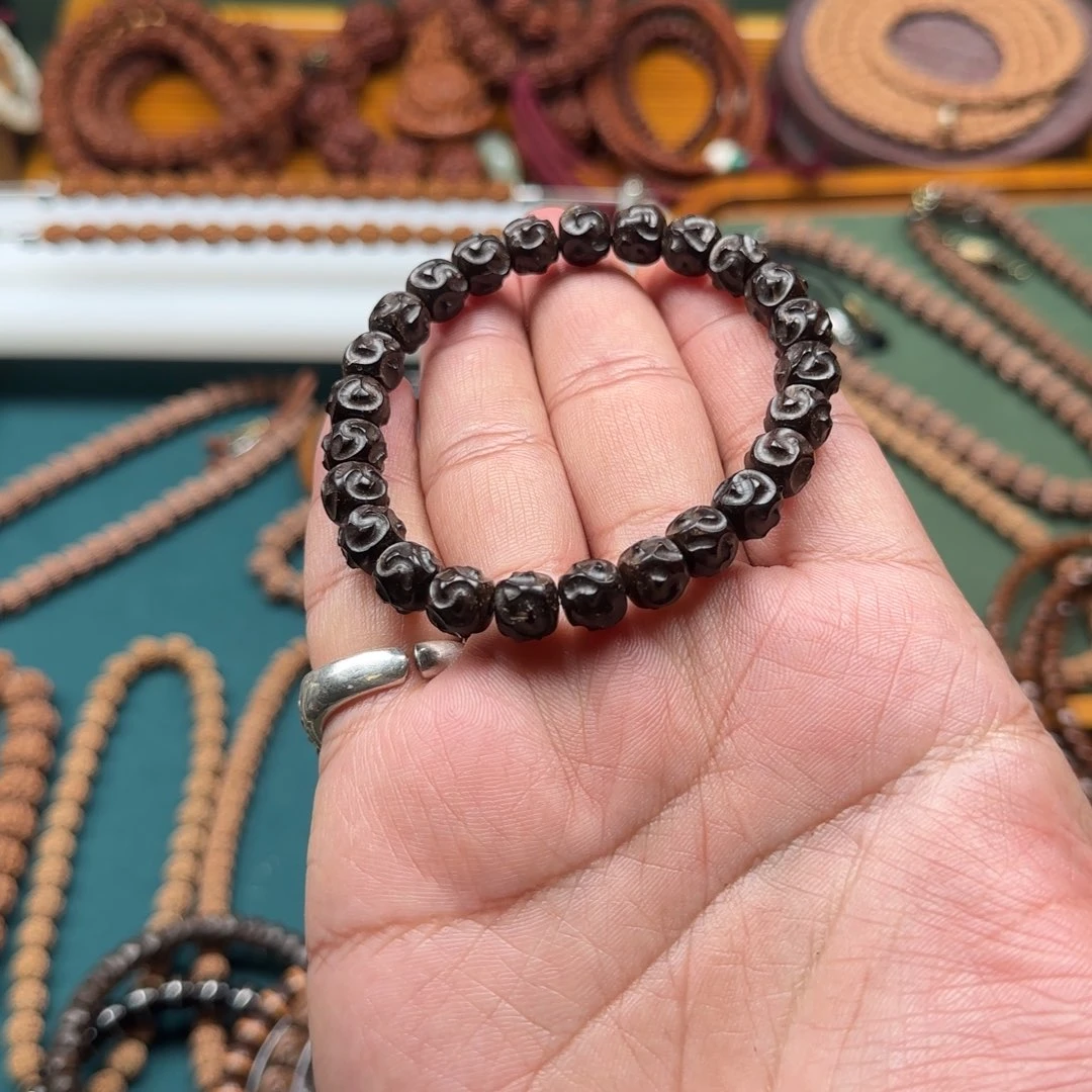 佩***奇椰蒂吊坠单圈手串