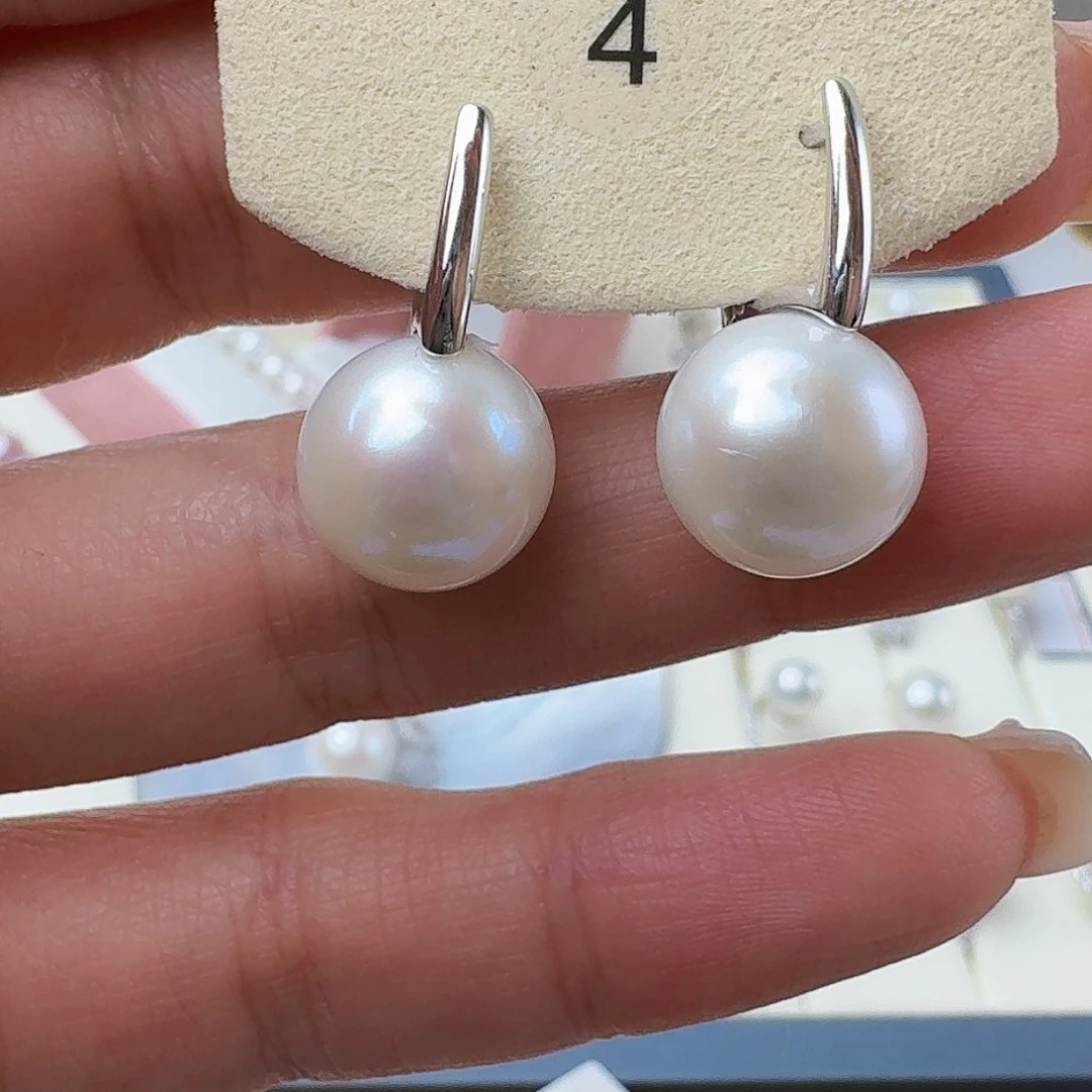 淡水珍珠耳饰银S925镶嵌灵*?