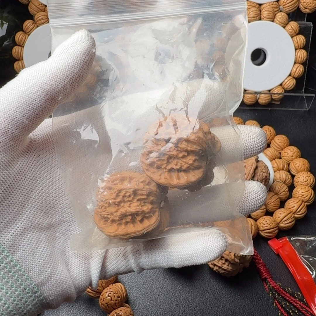 丽***桃核手串核桃把件