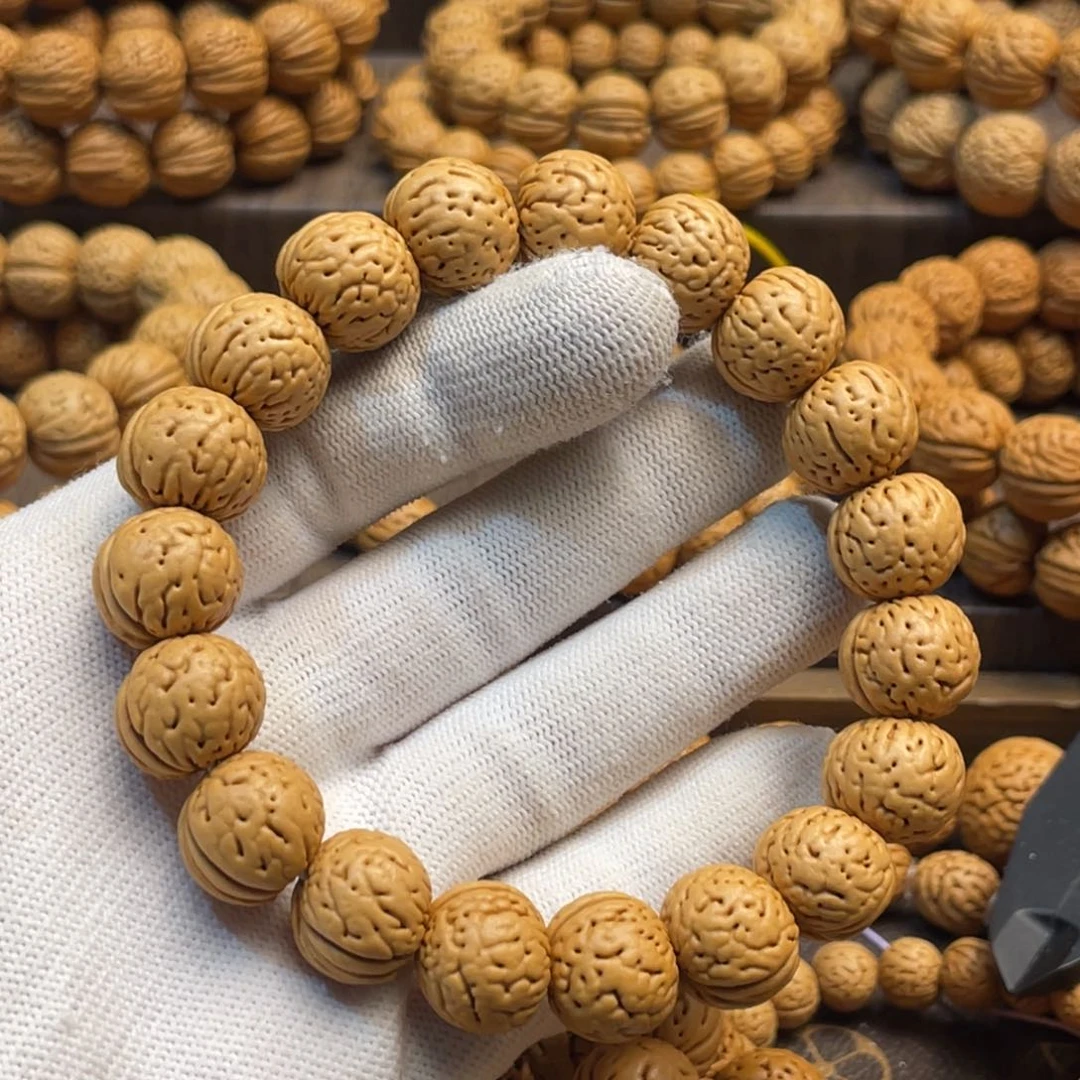 吊坠桃核身****远金丹手串