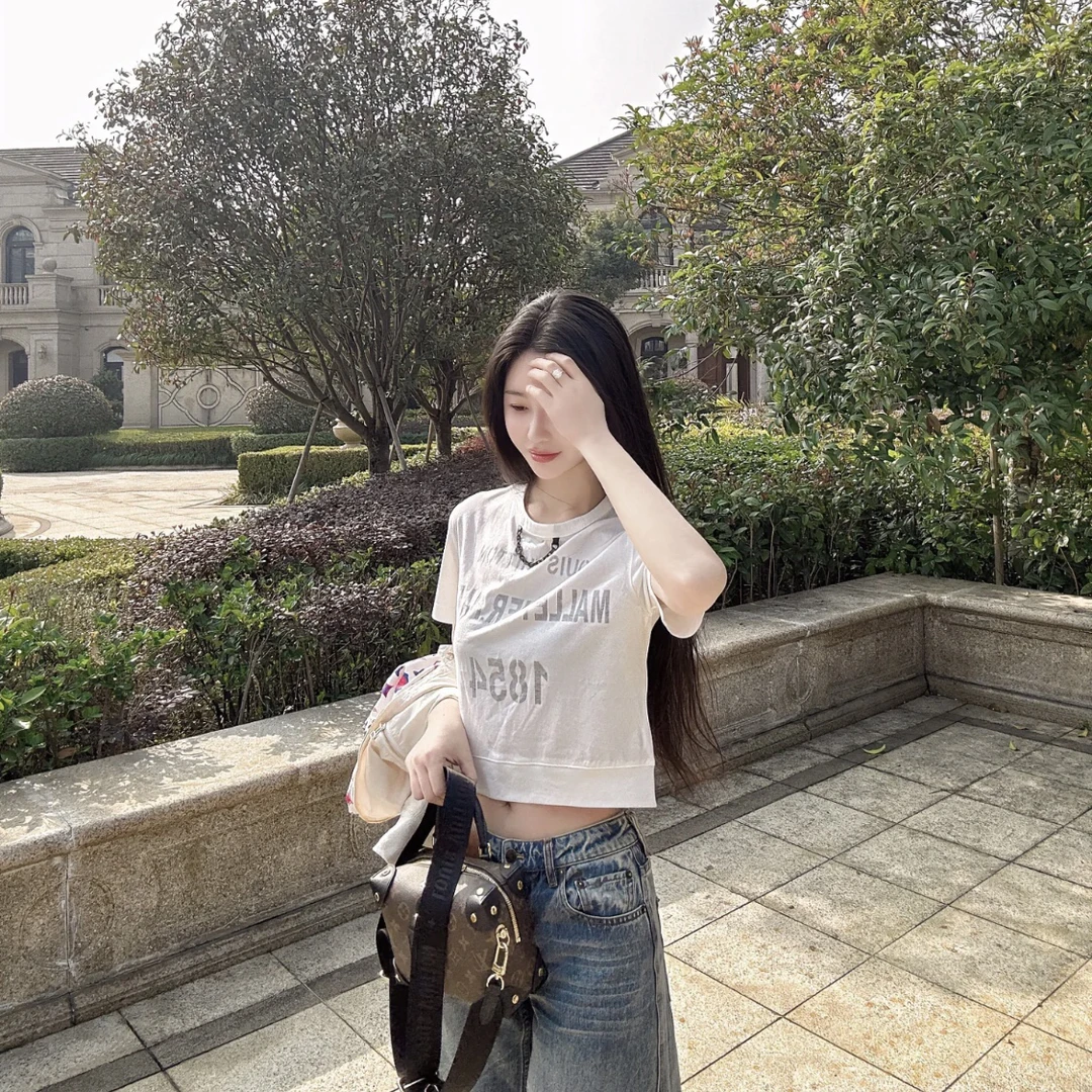 99新 LouisVuitton/路易威登 雕版印花元素短上衣 M码 GM004247