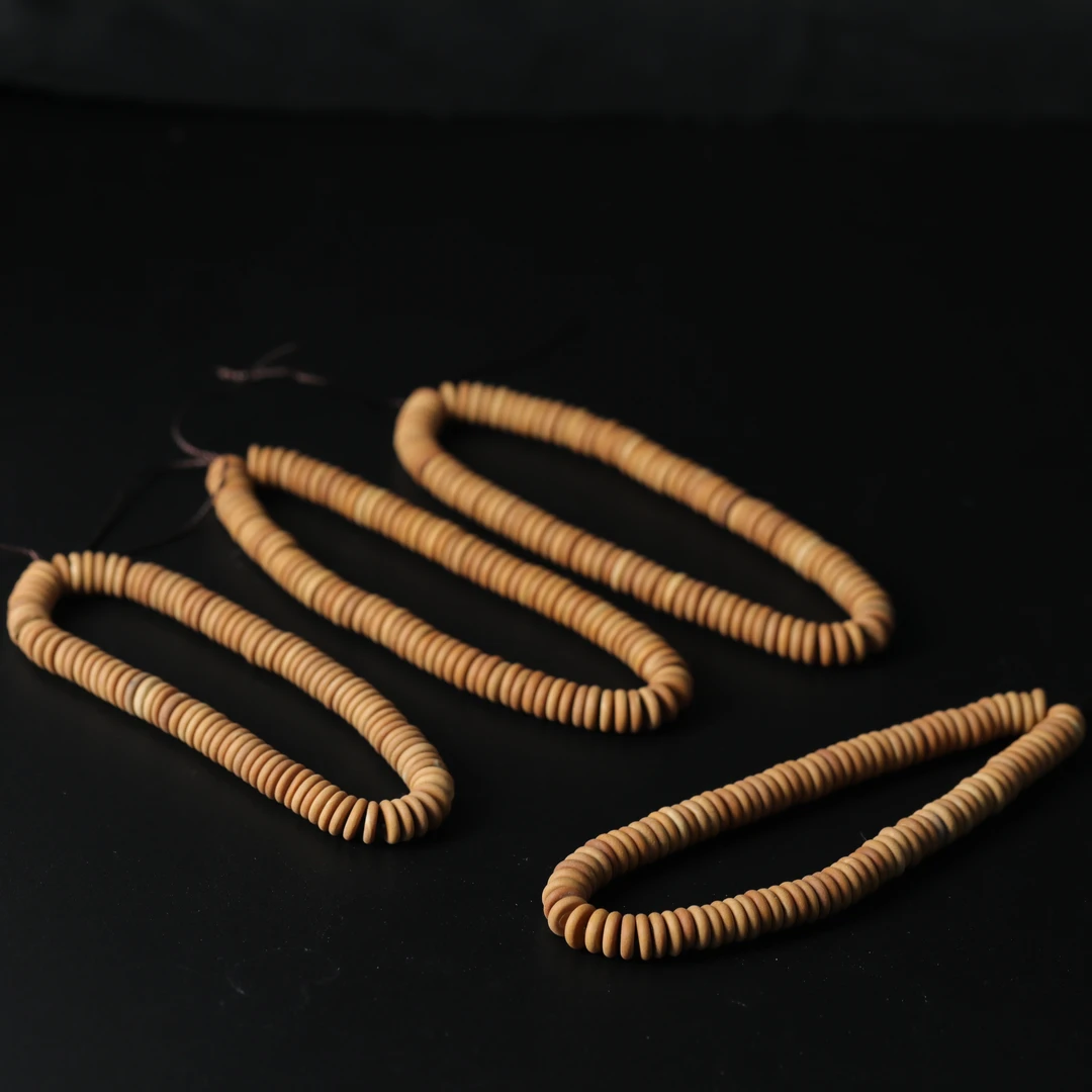 橄榄核手持（多样性发货发其一） 约7-8mm 11240113-08