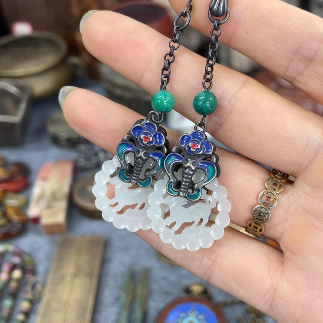 木正****…摆件。耳饰。