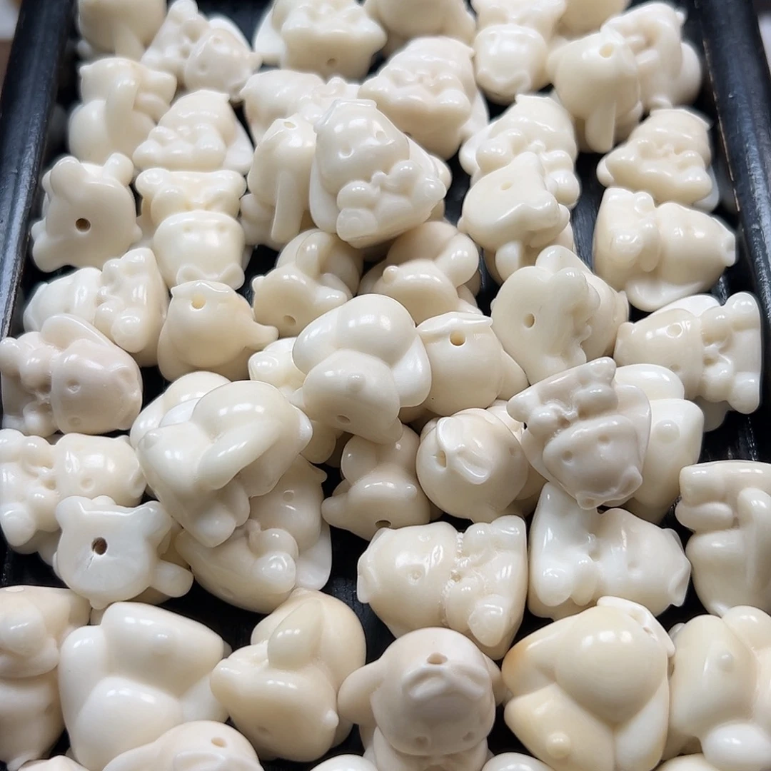 手串菩提根/象牙果瑕疵玉桂狗4颗