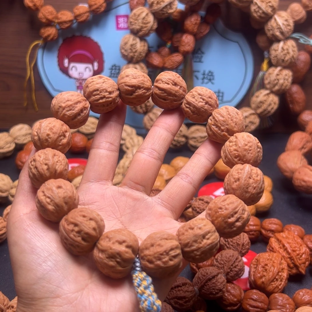冷***衩吊坠文玩核桃野生小核桃21加