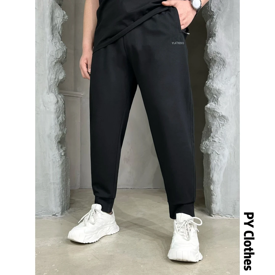 胖语大码男装 2025春季新款简约百搭棉质黑色休闲小脚卫裤8822#M