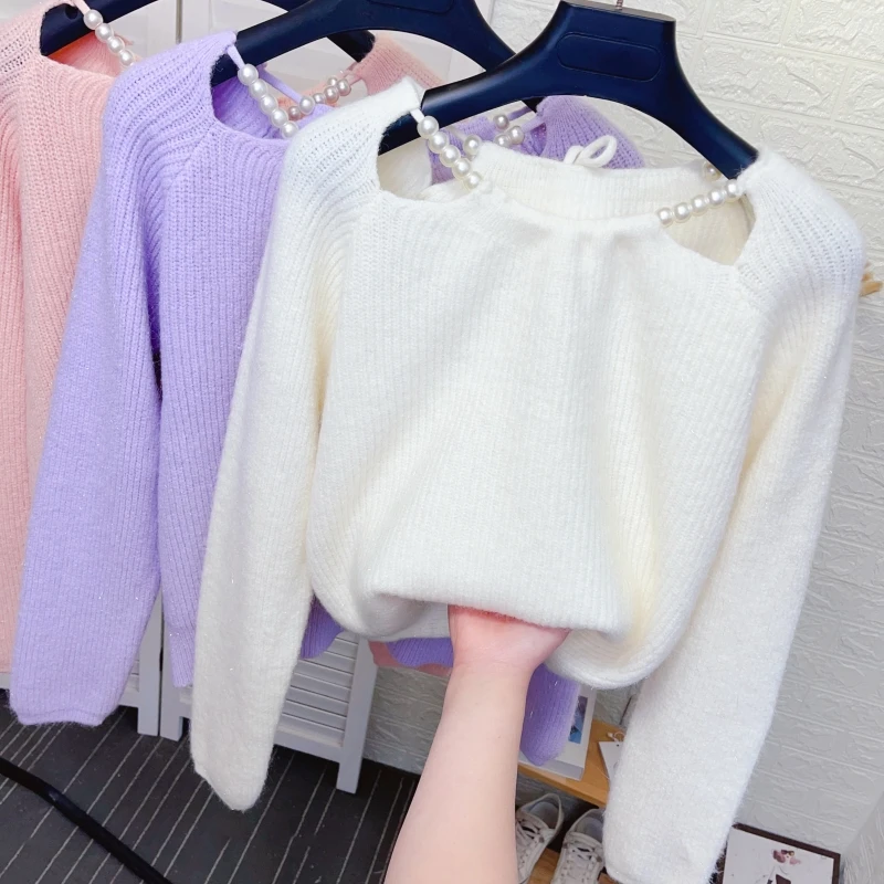 镂空露肩圆领外穿亮丝毛衣女秋冬新款甜美珍珠系带打底针织衫上衣