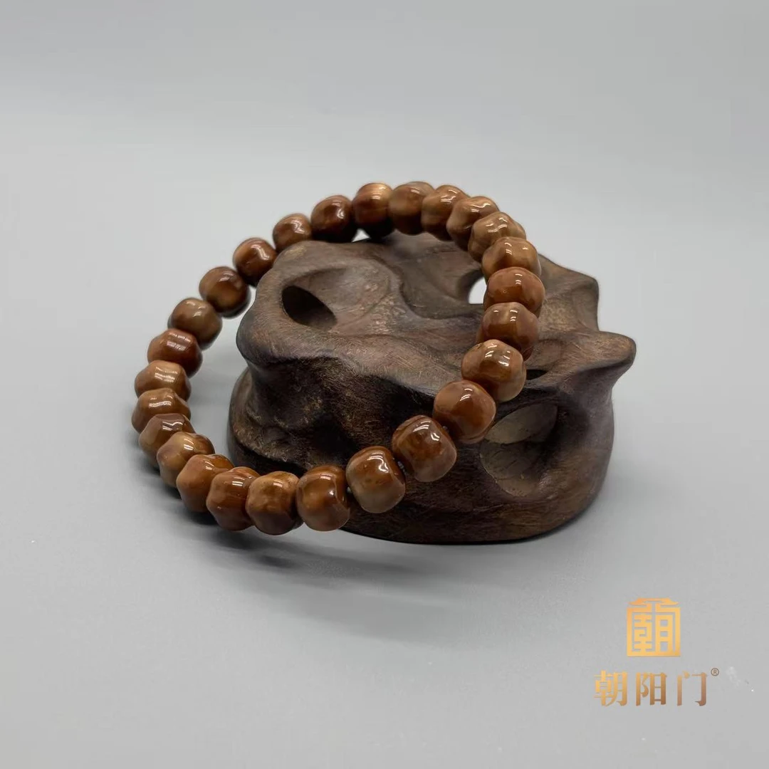 【D7554】库克新瓜珠 9*8mm 左右手串原生老油料天然棕线棕眼