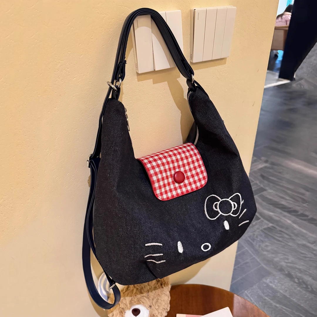 2025新款卡通kitty牛仔布双肩包女大容量通勤单肩包外出手提包包