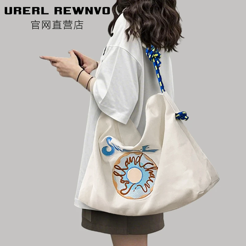 URERL REWNVO刺绣托特包女2025新款通勤大容量斜挎包休闲帆布包