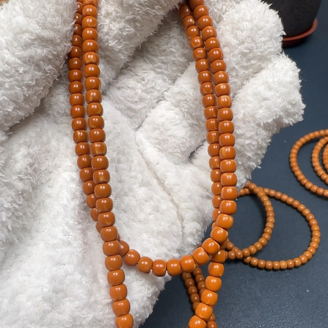 橄榄核手串老挝长串极限弧三花5.2mm