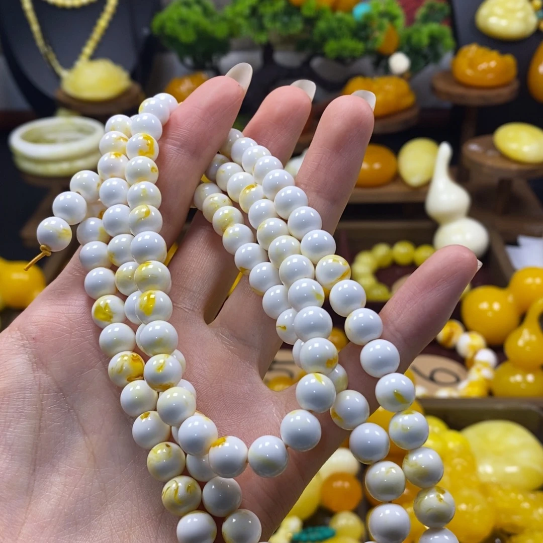 轩***刀溶洞妖花卡8念珠一条