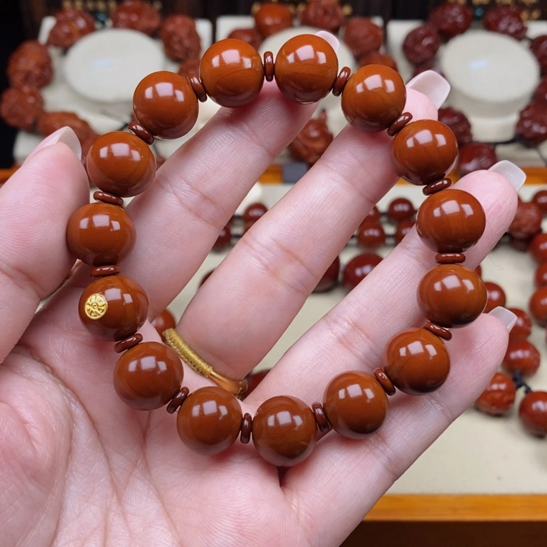 橄榄核吊坠M**程正圆光珠