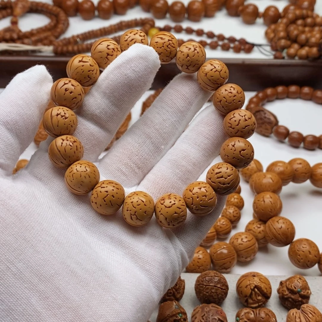 钢****╲桃核手工雕刻满花敦子