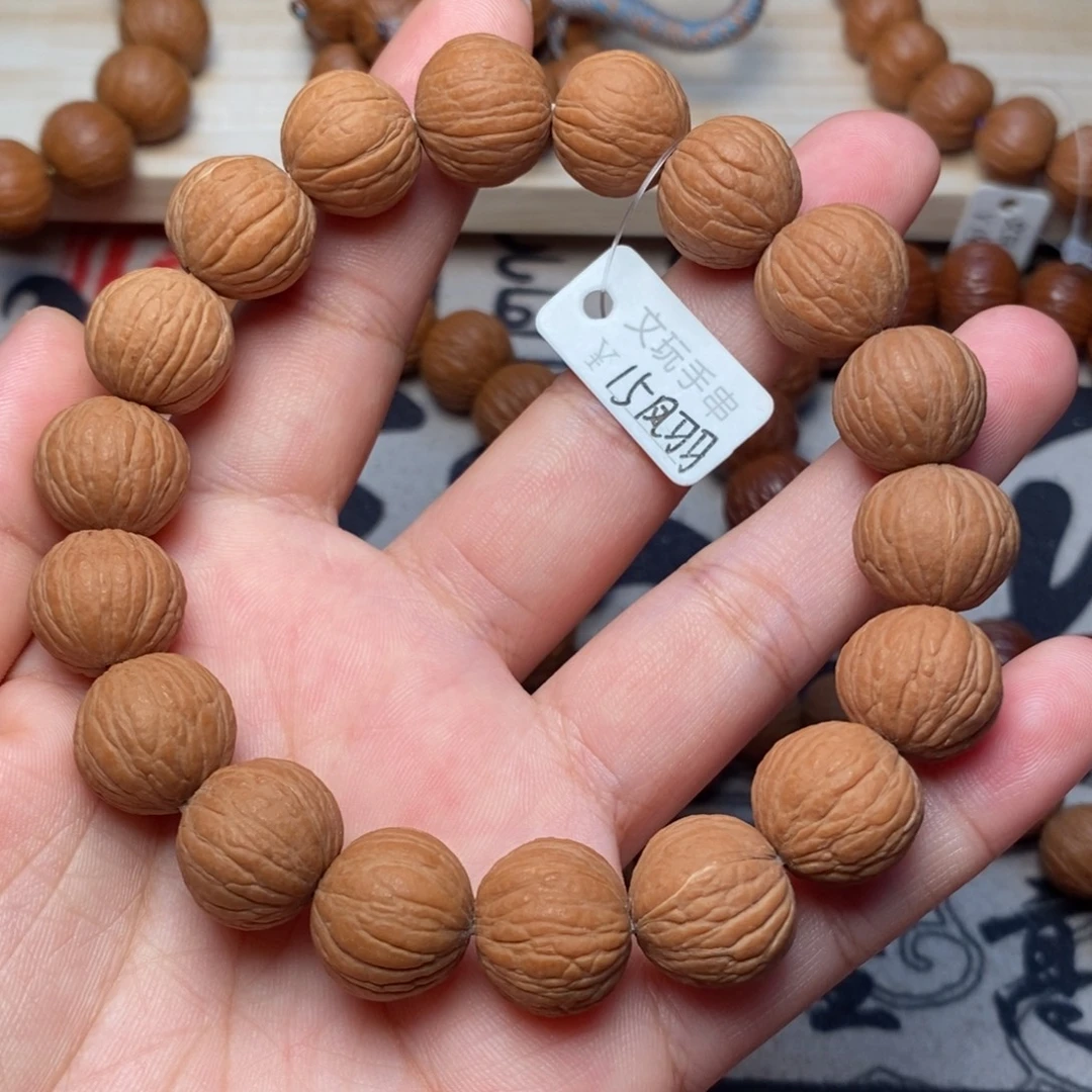 吊坠桃核原皮凤羽