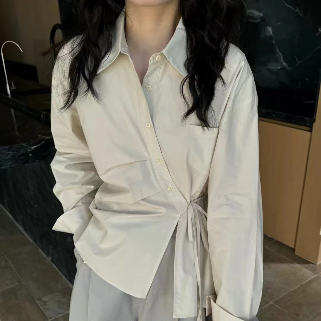 kittin@8252 韩系设计感不规则斜扣长袖小衫（衣长62）8-10