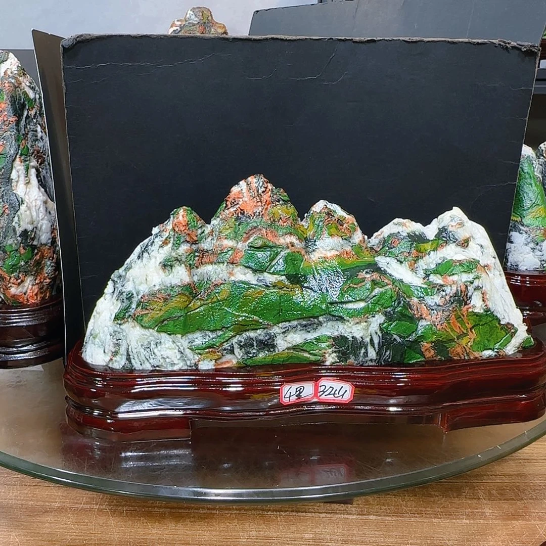 崇***行石材青海七彩石石头摆件