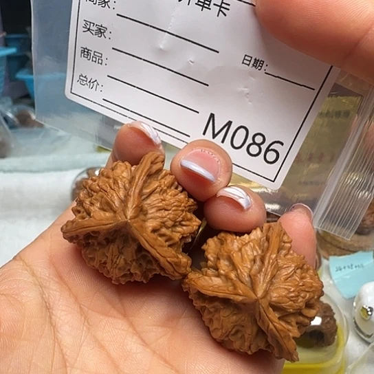桃核吊坠全品三棱