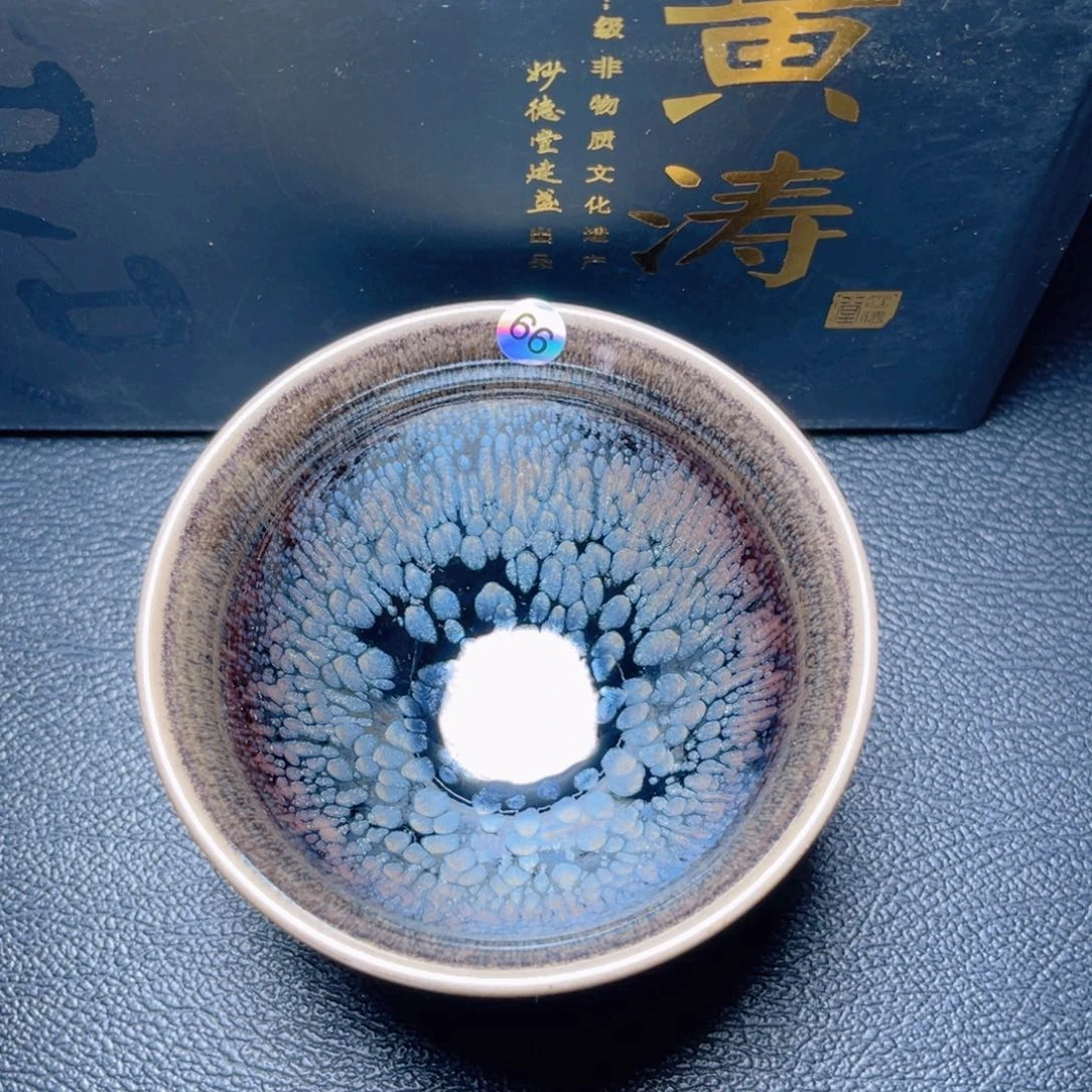 茶盏滴滴答答的声音响