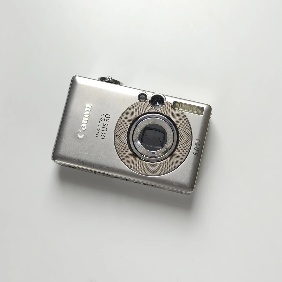 9新 Canon/佳能 ixus50银色500w像素3倍光学变焦数码相机