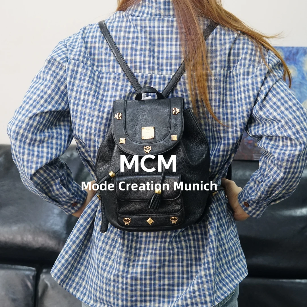 95新 MCM 黑金双肩包/WJ02516526/6526