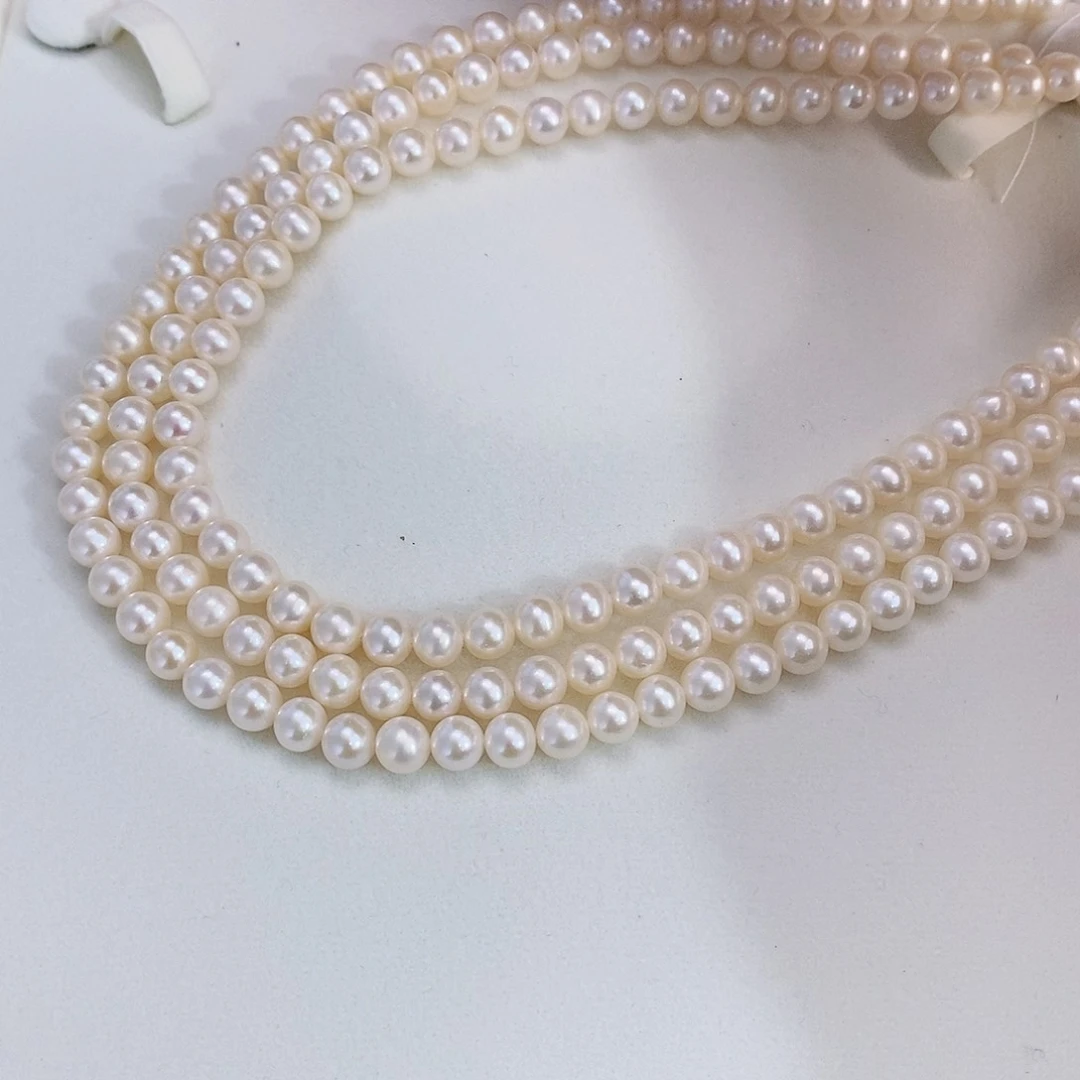 银S925镶嵌特价120cm无核近正圆无暇极光设计款淡水珍珠